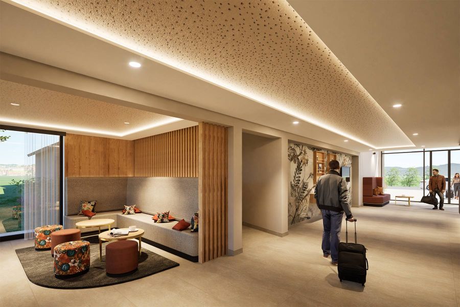 Moderner Lounge-Bereich Churfürstenhof Bad Birnbach verfügt über schallabsorbierende Decke indirekte Beleuchtung und Fliesenboden