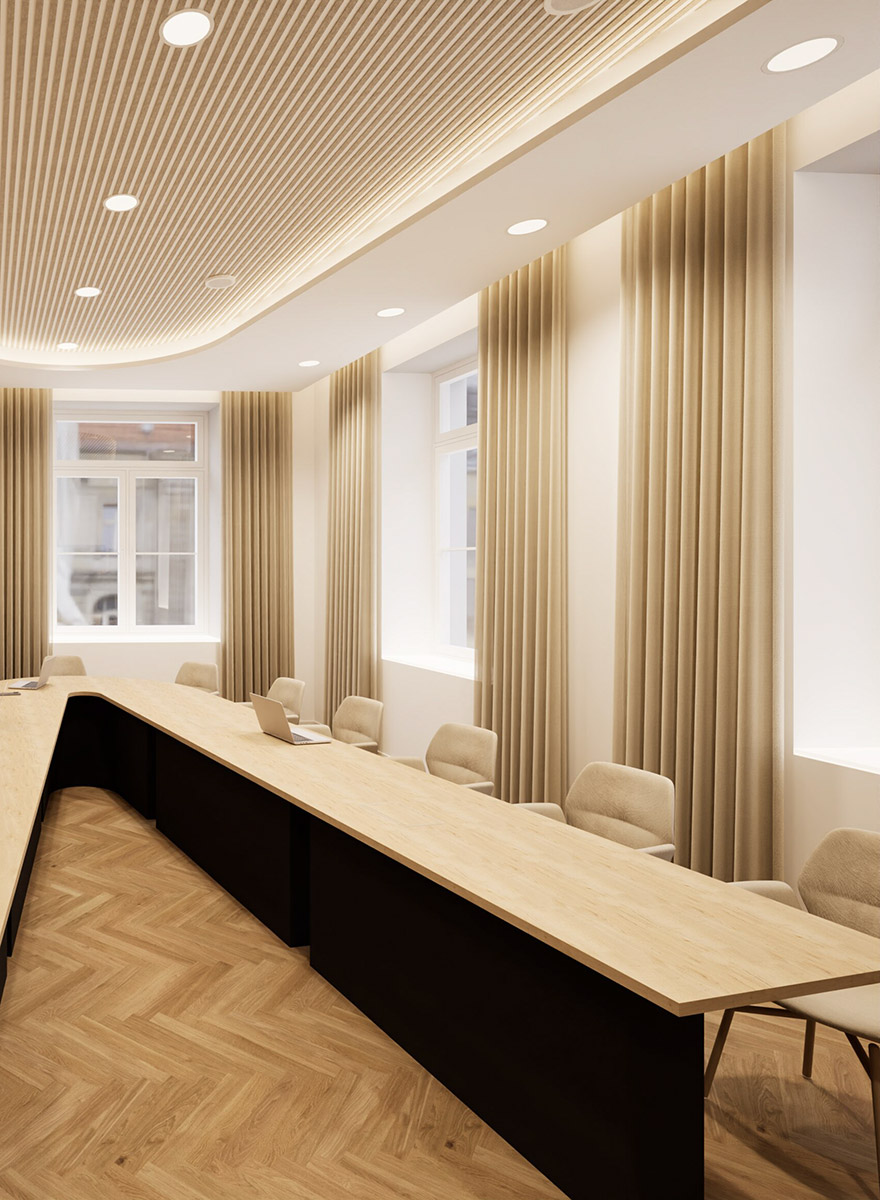 Konferenzraum mit Tisch in V-Form aus der Appia Möbelfertigung