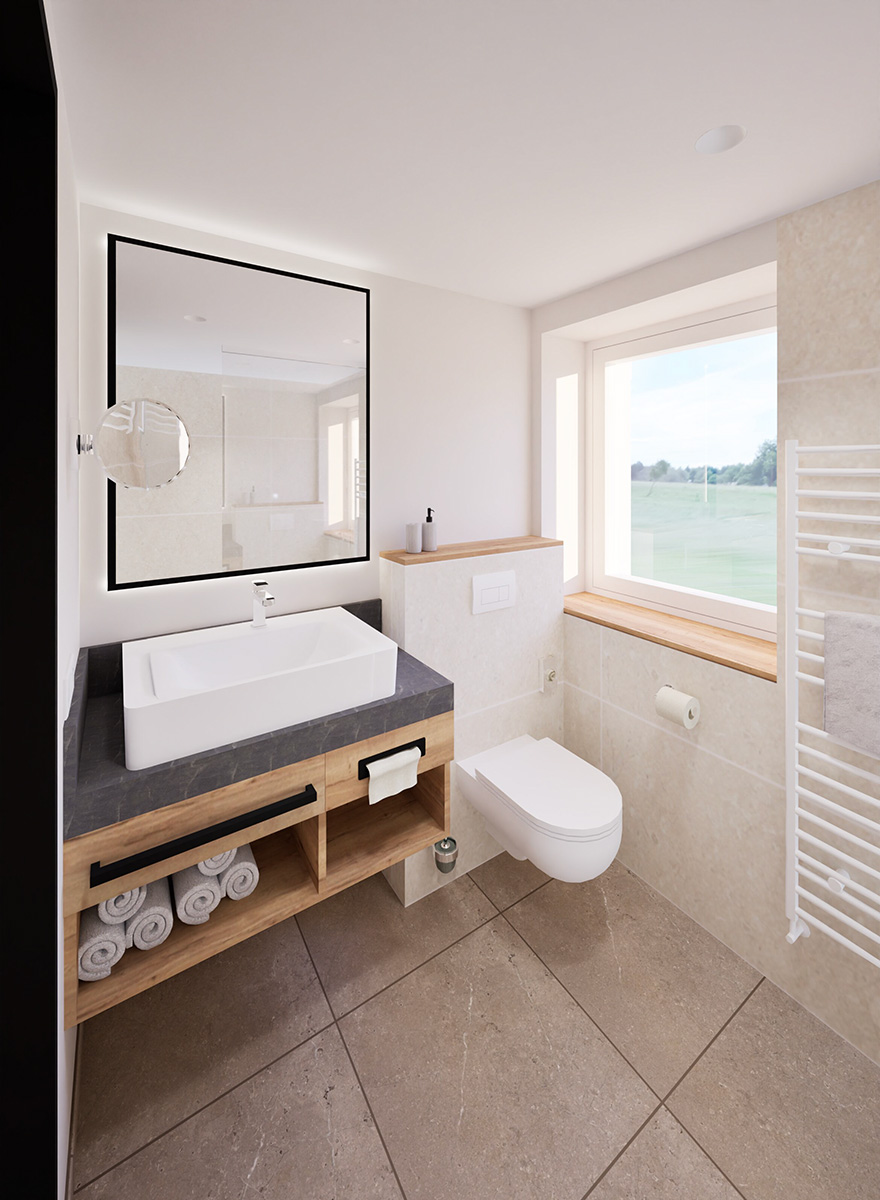 Badezimmer mit Blick in die Natur passend zum Interior