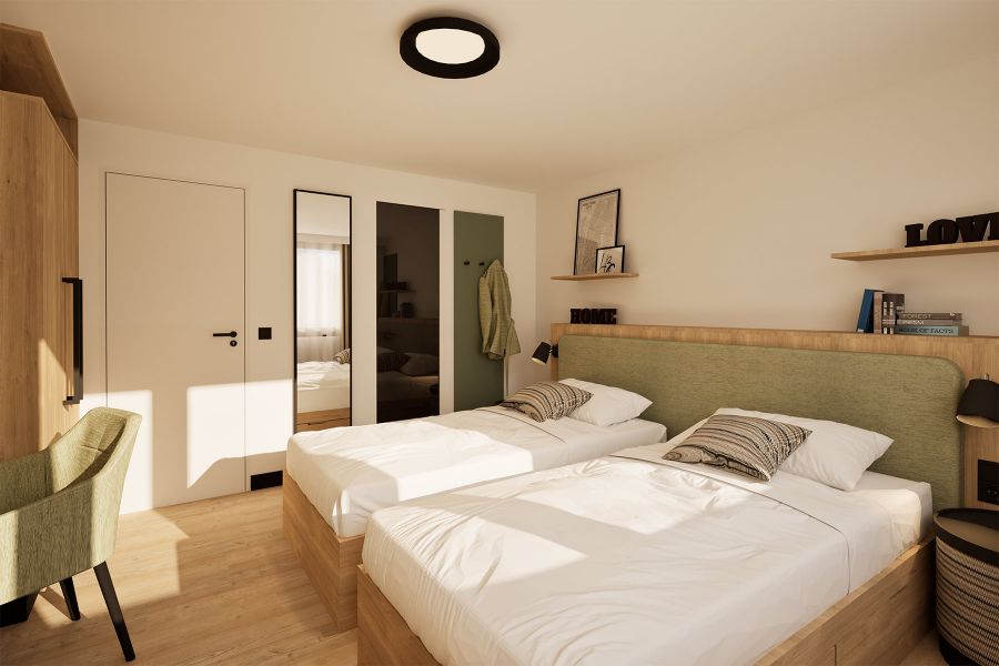 Personalwohnungen im Schweizer Gstaad Palace mit zwei Einzelbetten nebeneinander