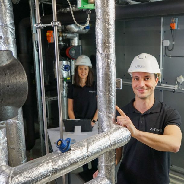 Appia employee checks technical building equipment