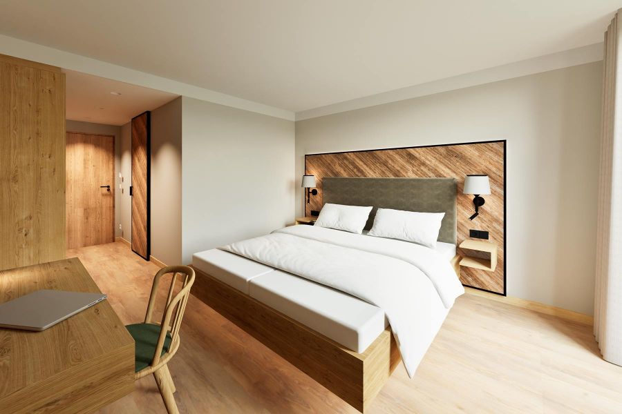 Schlafzimmer mit einem Bettkopfteil in Holzoptik