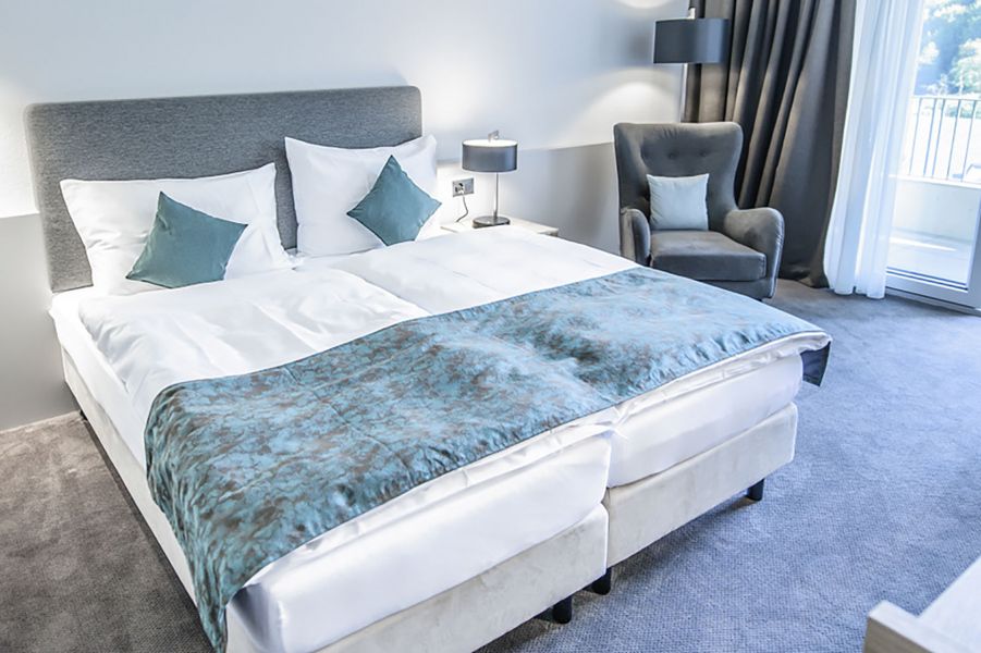 Doppelbettzimmer in Liestal im Hotel Bad Schauenburg
