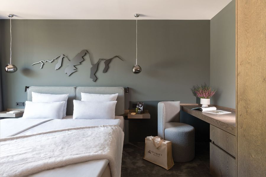 double bed at hotel Triforet alpin.resort