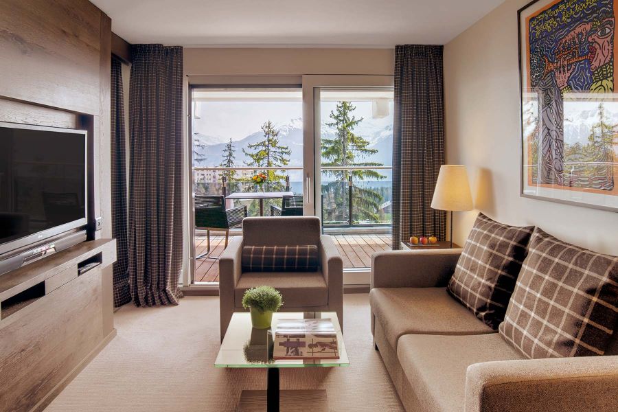 Komfortbereich im Schlafzimmer des Hotel Crans Ambrassador