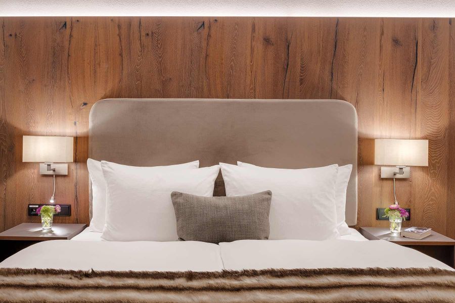 Gemütliches Bett im Alpenhof Murnau