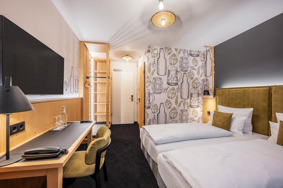 Double room in agriculture and brewing style with beer wallpaper